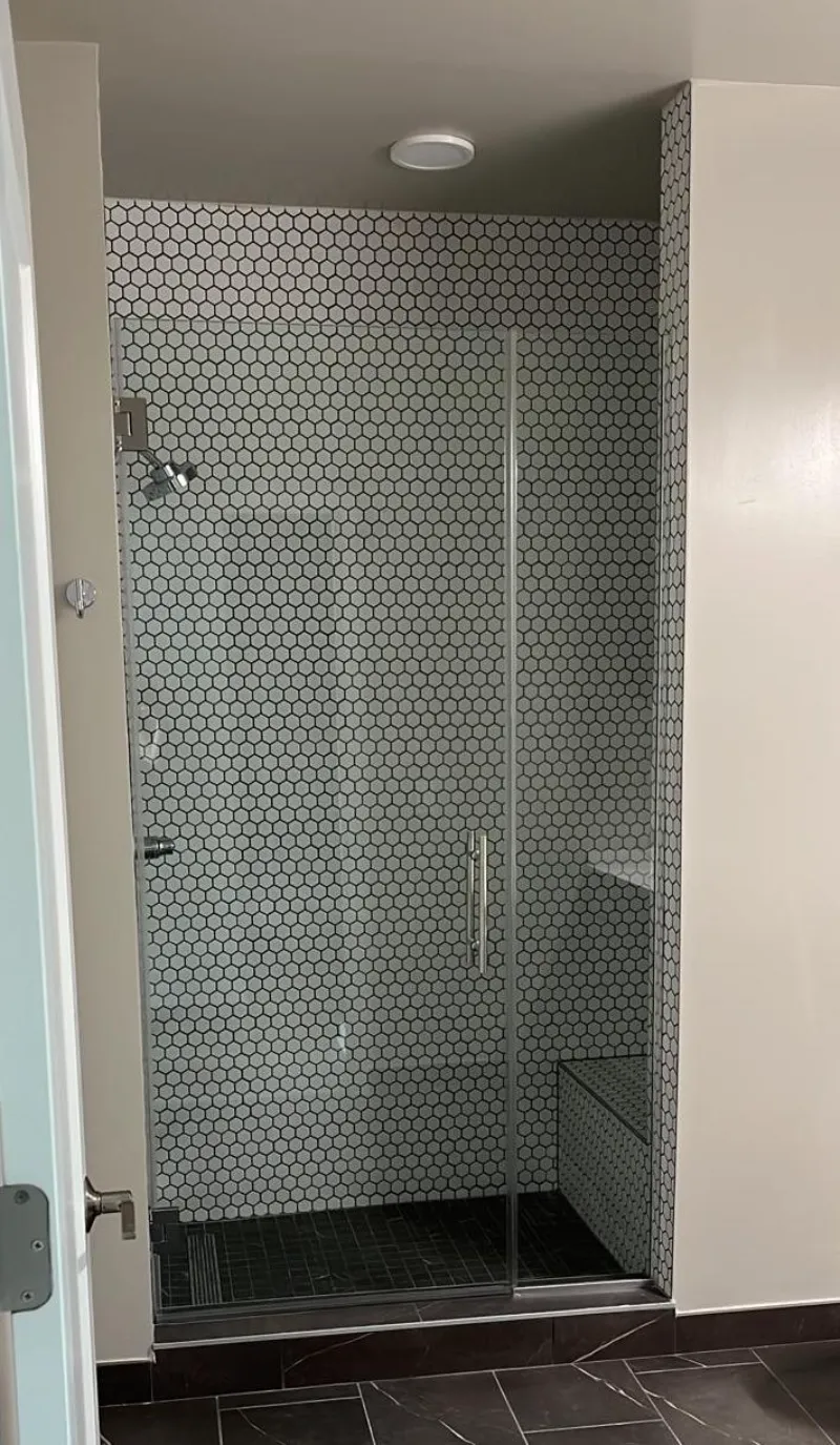 Glass shower doors at Reverb apartments